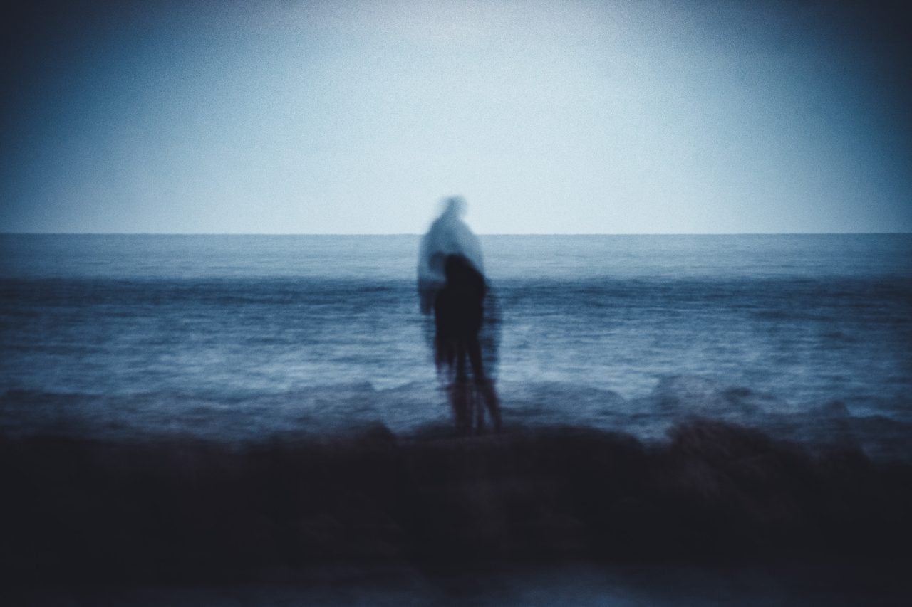 Man on rocks at the Toronto Beach || f/5.3 || 2s || ISO1250 || 185 mm || Nikon D7200 || 2024